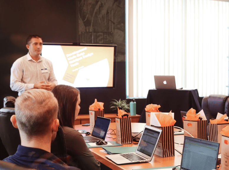 people having meeting with PPT